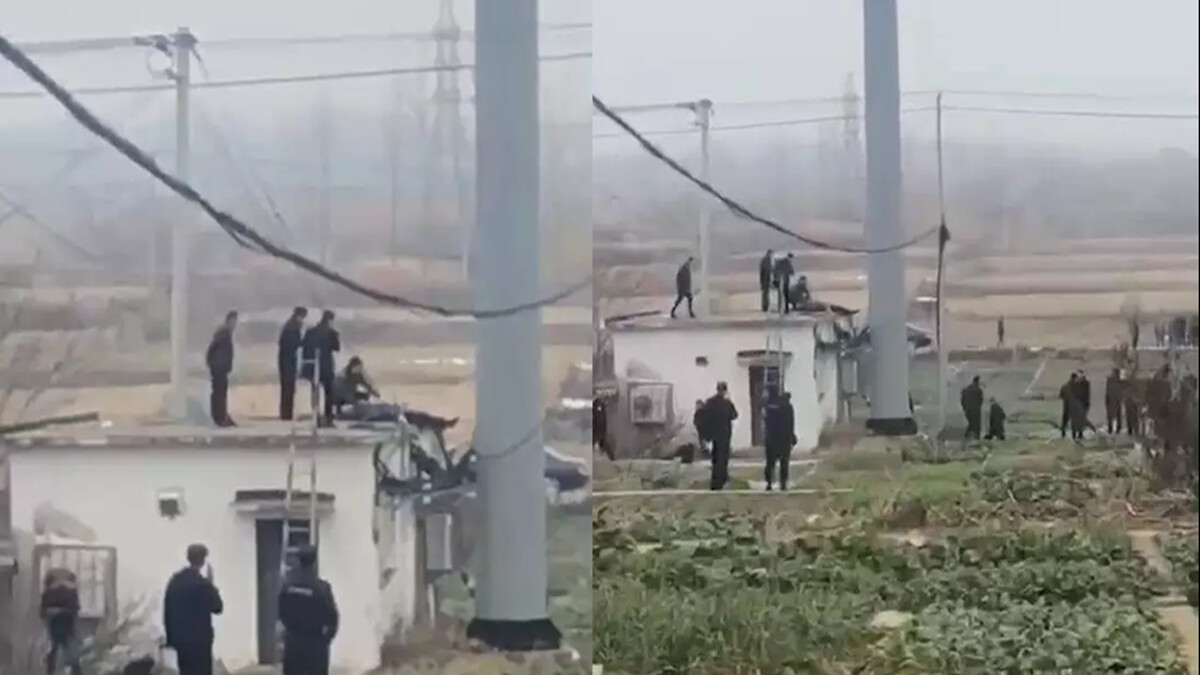 图为江苏仪征市刘集镇村民彭在林自杀现场。(视频截图).jpg 图为江苏仪征市刘集镇村民彭在林自杀现场。(视频截图).jpg